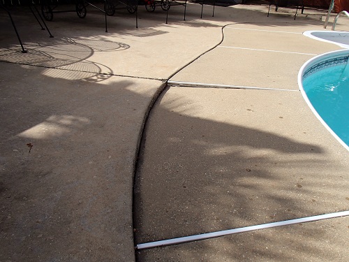 Sinking concrete pool deck