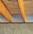 SilverGlo™ insulation installed in a floor joist in Silver Springs