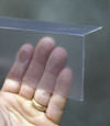 Closeup of a clear plastic covering on a Minden crawl space block wall