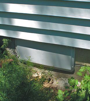A gray crawl space vent cover in Washoe Valley