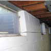 A foundation showing severe inward buckling along the windows in a Winnemucca home.