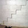 A diagonal stair step crack along the foundation wall of a Tahoe City home