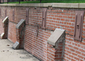 Rusted wall plate anchors in a retaining wall repair in Olympic Valley.