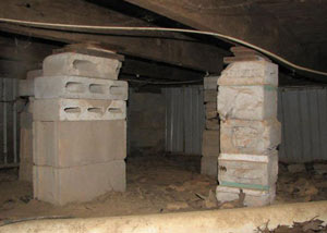 crawl space repairs done with concrete cinder blocks and wood shims in a Tahoe City home