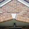 Major tuckpointing on a home archway over a door, with tuckpointing several inches wide that has failed on a Reno home