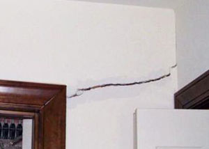 A large drywall crack in an interior wall in South Lake Tahoe