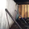 Temporary foundation wall supports stabilizing a Carson City home