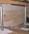 A system of crawl space support posts adding structural support to a crawl space in Virginia City
