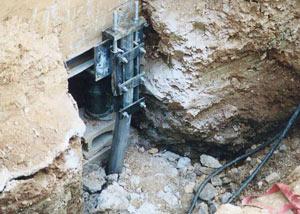 a bent, failed foundation push pier installed in Truckee.