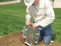 Fastening an earth anchor for a severely bowing wall in Incline Village.