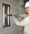Tightening a wall anchor plate in Carson City, Nevada