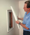 Reno installation of wall anchor plate covers for a finished basement