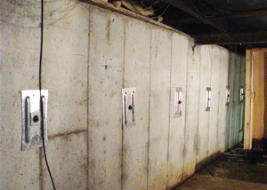 A foundation wall in Homewood repaired with foundation wall anchors.