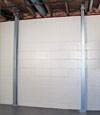 A steel i-beam system installed on a Tahoe Vista foundation wall
