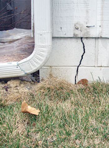 foundation wall cracks due to street creep in Doyle